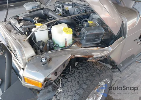 2000 Jeep Wrangler Sport from USA, damaged, VIN 1J4FA49S5YP781212